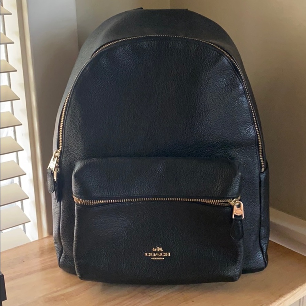 Coach black leather jacket pack